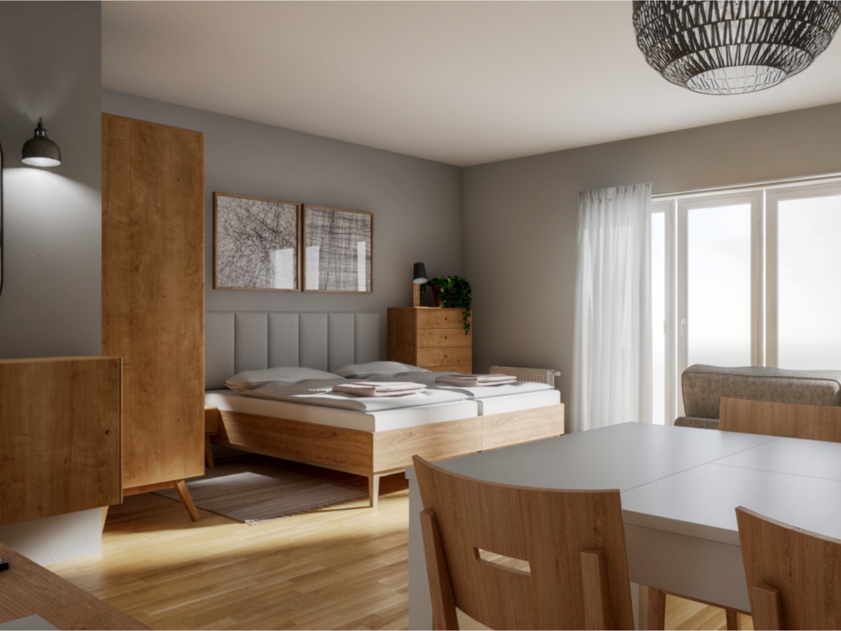 Jak ukryć łóżko w pokoju dziennym? Pomysł na projekt salonu z sypialnią