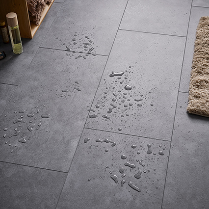 Panele winylowe z twardym rdzeniem i podkładem IXPE VOX Rigio Concrete Dark aranżacja